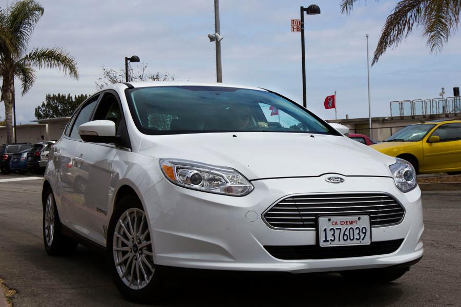 Administrative Assistant Alexandra Thierjung drives one of the City Colleges two new hybrid cars, Friday, April 24, in the East Campus faculty parking lot. This fall the Alternative Transportation Plan will be offering incentives for students who use alternative transportation to get to school.