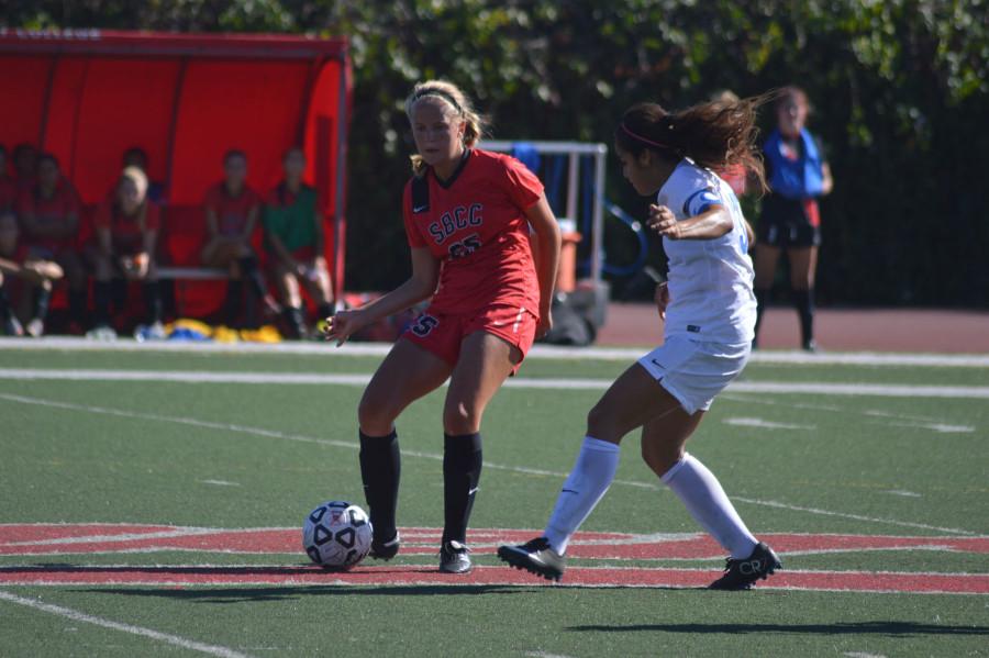 Josefine Von Der Burg (No. 25) for Santa Barbara City College dribbles the ball against San Bernardino Colleges Darrian Gonzales (No. 33) during the game at La Playa Stadium in Santa Barbara, Calif. on Tuesday Sept. 29, 2015. Von Der Burg scored twice for City College during the game, which ended with San Bernardino winning 4-2.