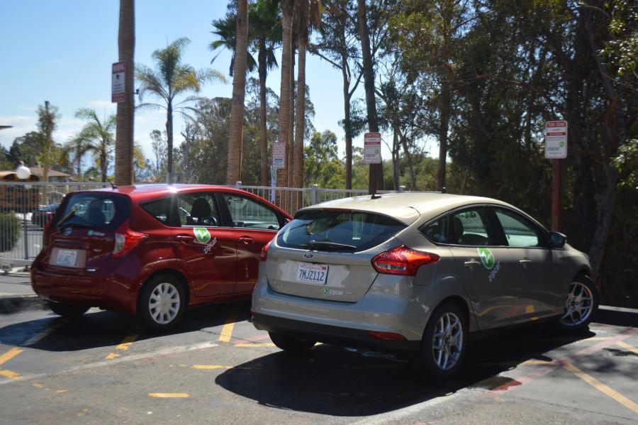 The two Nissan Versa Zipcars are parked outside the apartment complex Beach City on Wednesday Sept. 16, in Santa Barbara. The cars are rented through a mobile app or their website, with the minimum age of 18.
