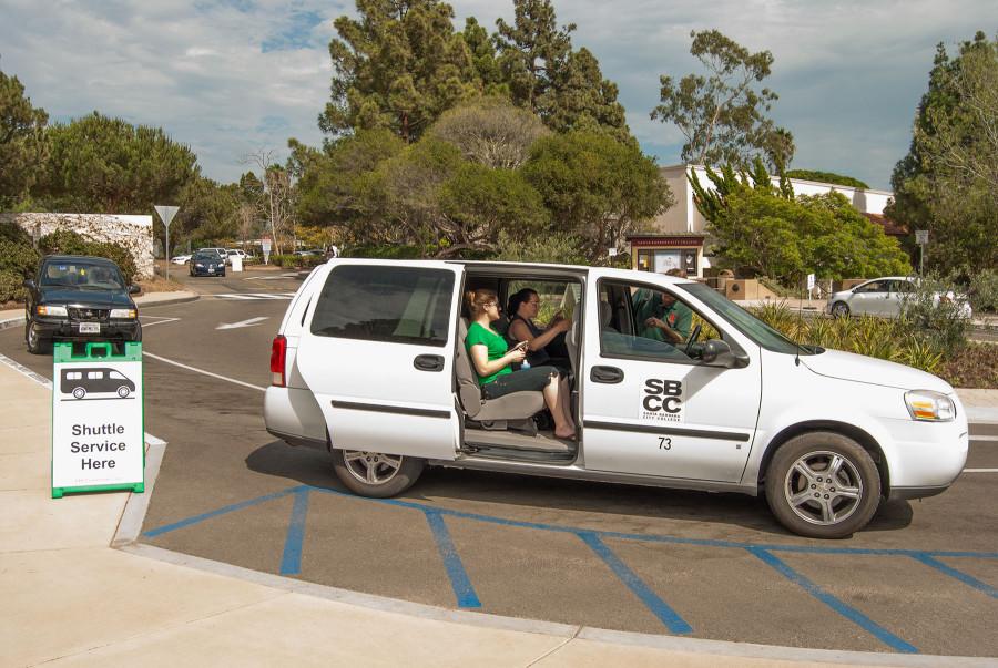 A free park-and-ride shuttle van headed to the Wake Campus carries student Amanda Probst (left), Culinary Arts staff Kaylene Thomas, and driver James Chambliss Thursday, Sept. 10 on East Campus. Two shuttle vans circulate daily from the Wake Campus and the Garden Street parking lot as part of SBCC Commute programs effort to popularize sustainable transportation and reduce on-campus parking.