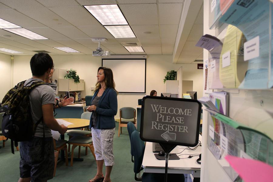City College Career Counselor Holly Eubank (right) helps student Takuya Higuchi on Thursday, Oct. 8, at the Schall Career Center in the Student Services Building on East Campus in Santa Barbara.