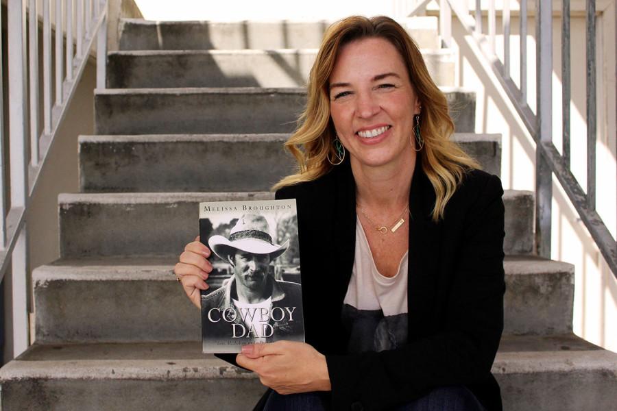 City College Alumni Melissa Broughton with her new book ‘Cowboy Dad,’ Thursday, Oct. 8, on East Campus. The author released her memoir June 2015, offering a candid look at her life with an alcoholic father as well as the lifestyle she led while living on a small town ranch.