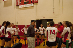 Coach Ed Gover (center) talks with the lady Vaqueros and assistant coach Steve Zelko, after the third set in a match against College of the Canyons on Wednesday night, Sept. 30 in the Santa Barbara City College Sports Pavilion in Santa Barbara. The Vaqueros beat the Cougars, 3-1.