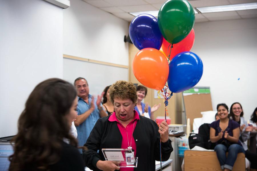 Allied Health and Nursing Lab Coordinator, Anne Stark, is surprised to receive her award presented by Rebecca Wurm (left), Client Representative for ATI Nursing Education, Monday, Sept. 28 in the Administration Building on East Campus in Santa Barbara. This award allows Stark to attend the 2016 ATI National Nurse Educator Summit alongside 'the top thinkers, lecturers, and teachers in nursing education.’ (http://www.nursingsummit.com/)