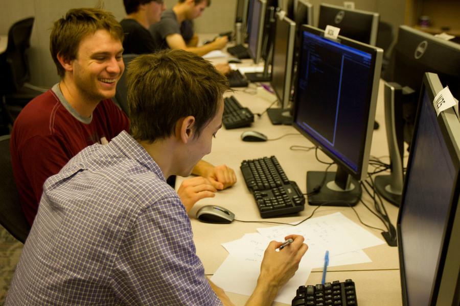 Zayne Christenson (left) and Andrew Fisher, members of the Computer Science Club, work together to figure out the problems in the computer contest, Sunday Oct. 25 at Santa Barbara City College. Christenson and Fisher compete together as a team, named the Screaming Gazelles.