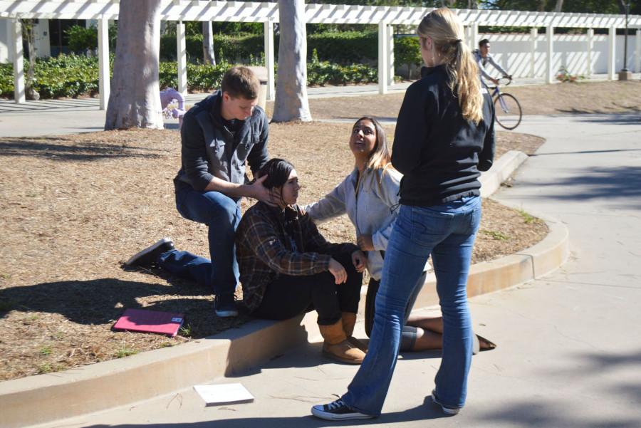 From left, Brandon Burkhardt, Alisha Blanco, Jasmine Montes De Oca and Jade Wilson practicing a medical situation during a lab session for the Emergency Medical Technician class, Thursday, Nov. 5, on East Campus in Santa Barbara. The class has six hours of mandatory lab every week, and an additional five hours of lecture.