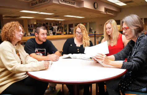 The editors for City College’s online literary magazine ‘Painted Cave,’ from left, Kathryn Lubahn, Grady Olson, Danielle Anderson, Rachel Bower and Faculty Advisor Dr. Chella Courington gather for a meeting, Thursday, Nov. 19 in the Luria Library. ‘Painted Cave’ publishes bi-annually, and was awarded last month for the best online student-run literary journal of California community colleges.
