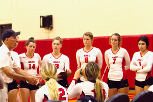 Head coach Ed Gover talks to the lady Vaqueros during a time-out in the fourth set of a playoff match against Mt. San Antonio College, Tuesday night, Nov. 24, in the Santa Barbara Sports Pavilion. The Vaqueros beat the Mounties, 3-2.