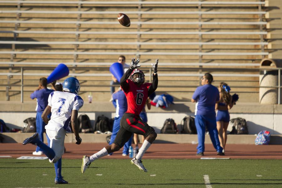 Wide receiver Calvin Crockett (No. 6) catches a 46 yard touchdown pass for the Vaqueros football team Saturday afteroon, Nov. 7, at La Playa Stadium. Santa Monica beat City College, 37-21.