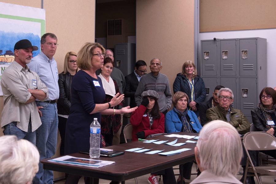 Dr. Lori Gaskin, City College superintendent-president, explains to community members of the Santa Barbara Mesa how the college enrollment has declined in recent years, Monday night, Nov. 30, at The Holy Cross Church property on Cliff Drive. Community members expressed their concerns regarding the impact of a proposed expansion of the housing at the Beach City complex.