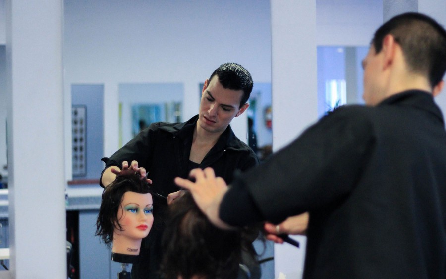 Ramirez practices styling on mannequins on Wednesday, Feb. 25, at the Santa Barbara Cosmetology Academy in Goleta, Calif. Ramirezs main focus in the program is hair cuts and dyes.