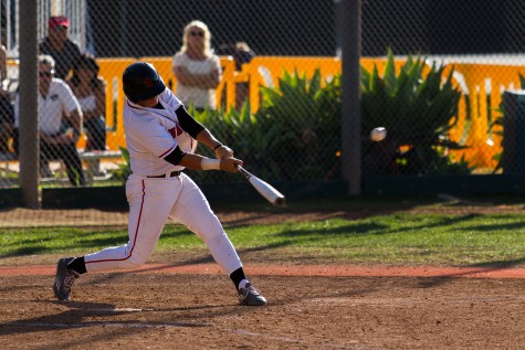 Santa Barbara City College Vaqueros men’s baseball team played host to the Condors from Oxnard College on Thursday afternoon, Feb. 25, at Pershing Park in Santa Barbara. Christopher Smutny, Vaqueros’ third baseman, gets a well timed hit that helped his team to a 7-2 victory over the Condors.