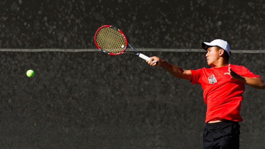 Ryan Chung, of Santa Barbara City College’s Men’s tennis team, tracks down the ball to make a forehand passing shot at Pershing Park on Thursday, Feb. 18. The Vaqueros hosted the Pirates from Ventura College in a season opening match, but despite their efforts the Vaqueros lost 6-3.