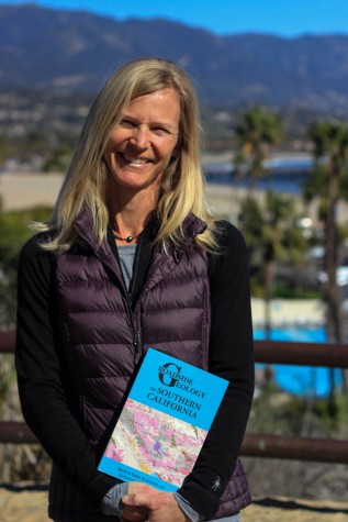 Elizabeth Gans, geology lab assistant at Santa Barbara City College, with her newly published book “Roadside Geology of Southern California” on Thursday, Feb. 4 at the Winslow Maxwell Overlook on East Campus. The book is a motorist’s guide to the geological features found around Southern California.