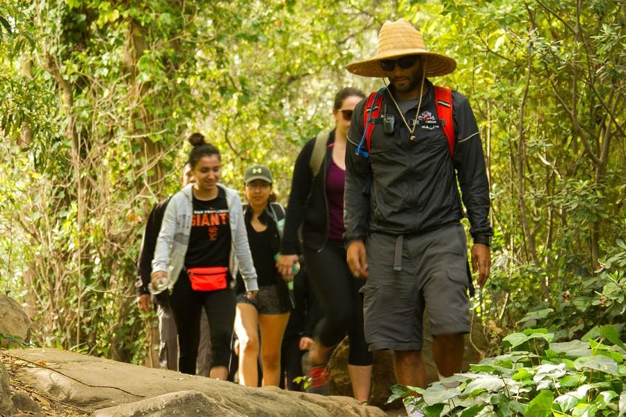 Students start the day’s hike off with smiles Friday morning, March 4, at San Ysidro trailhead in Montecito, Calif. The beginning of the hike wanders through a lush residential area before turning into a single track trail with hundreds of feet in elevation change.