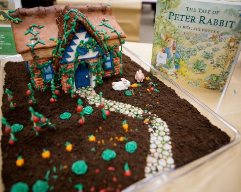 Lauren Peikert, 24, wins with her rendition of the “Tale of Peter Rabbit” at the 6th Edible Book Festival on Wednesday afternoon, March 23, in City Colleges Luria Library. Peikert’s cake won Best representation of scene, line, character, or theme of a book, as well as winging People’s Choice and took the cake for Best in Show.