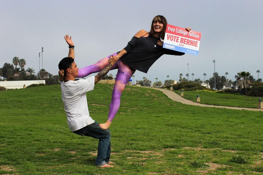 Arianna Thorne, club president of Santa Barbara City College for Bernie Sanders, preforms acrobatic stunts with fellow Bernie supporter, Keenan Conway, to attract students to join the club on Monday, March 1, in front of the Luria Library on the SBCC campus, Santa Barbara, Calif. The club meets on the last Thursday of each month in the Luria Library at 6 p.m.