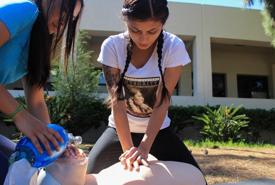 From left, Lingling Pan and Ivette Casas practice CPR for the Emergency Medical Technician Program on Thursday, March 16 at Santa Barbara City College. The program teaches students the skills necessary for treatment of emergency injuries and illnesses.