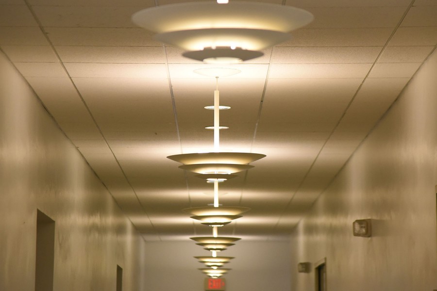 The Administration Building’s inefficient and outdated lighting still hang from the ceilings on Friday, March 4, at City College. The lights are slated to be replaced with longer lasting eco-friendly lights that will save hundreds of thousands of dollars over time.