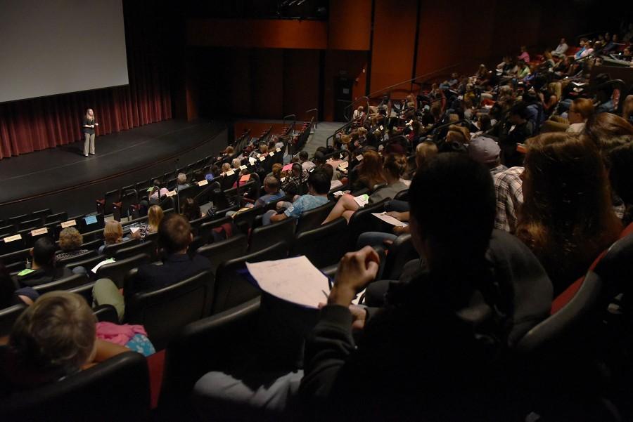 Alison Malmon, founder and executive director of Active Minds Inc., speaks to a large audience about mental health of young people on Tuesday, March 22, in the Garvin Theatre at City College. Malmon founded Active Minds after her brother passed away from suicide and she found that there were no support groups for individuals with mental health issues on her college campus.
