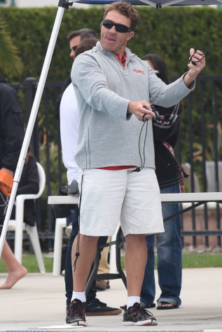 Swim coach Brian Roth instructs swimmers in the pool during City Colleges first swim meet on Saturday, March 5, 2016, at the Ventura Aquatic Center in Ventura Calif. Roth has been City College’s swimming and water polo coach since 2014 and before that he had coached many other swim teams in the Santa Barbara area.