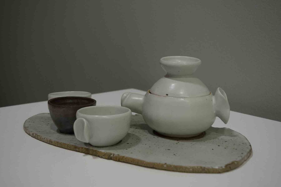 Tea+For+Three+is+a+piece+of+art+that+is+being+displayed+at+the+student+art+exhibit+Bits+and+Pieces+on+Tuesday%2C+March+2%2C+in+the+John+Dunn+Gourmet+Dining+Room+at+City+College.+The+ceramic+tea+set+was+created+by+City+College+student+Marla+Mockus.
