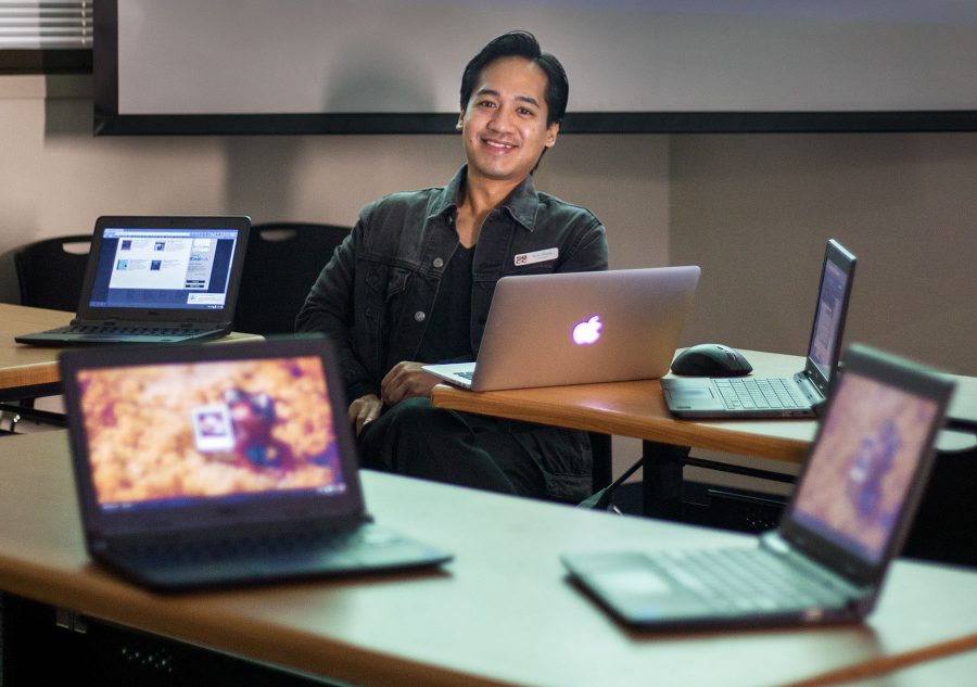 Sean Flores, systems and technology librarian, sits surrounded by some of the library’s computer resources on Friday morning, April 15, at the Luria Library in Santa Barbara. Flores maintains all of their electronic resources including the official webpage database.