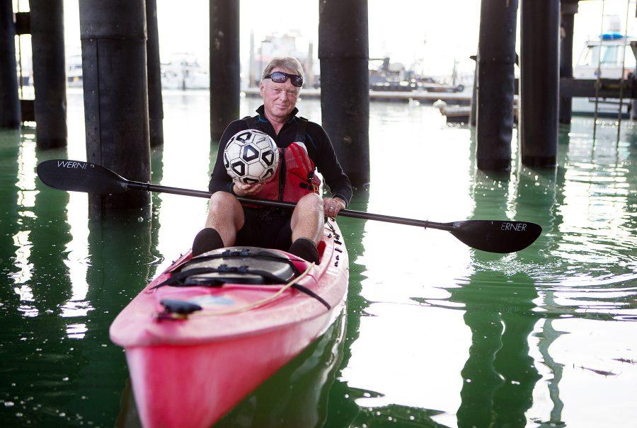 John Sisterson, city college soccer coach and kayking instructor, gets ready to kayak with his students on Tuesday morning, April 26, at the Leadbetter Beach docks in Santa Barbara. Sisterson has been teaching both men and womens soccer at City College for 12 years and introduced the kayaking class to the college 10 years ago.