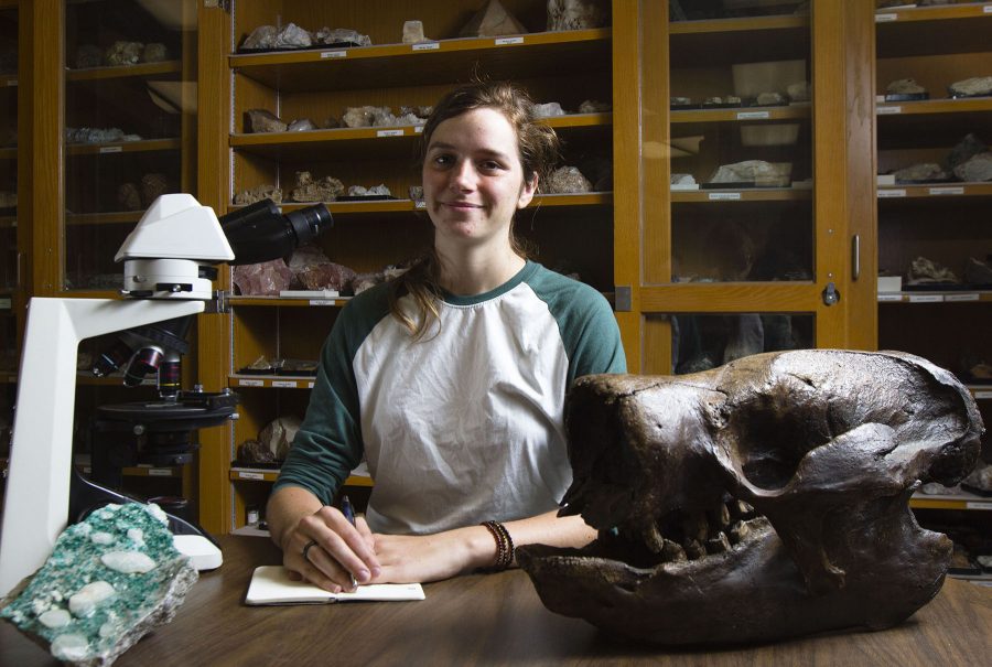 City College student, Amanda Allen, finds herself at home in the geology department on Monday, April 11, at Earth and Biological Science building at Santa Barbara City College, Santa Barbara. Allen’s favorite things in the department are the giant sloth skull and the plethora of crystals that line the walls.