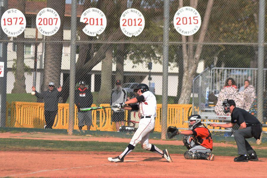 Vaquero sophomore catcher Andrew Cosgrove hits an RBI double in the bottom of the ninth inning to come within one run of Riverside City College in the wildcard playoff game on Tuesday, May 3, at Pershing Park in Santa Barbara. The Vaqueros could not keep the momentum going and lost 3-2.