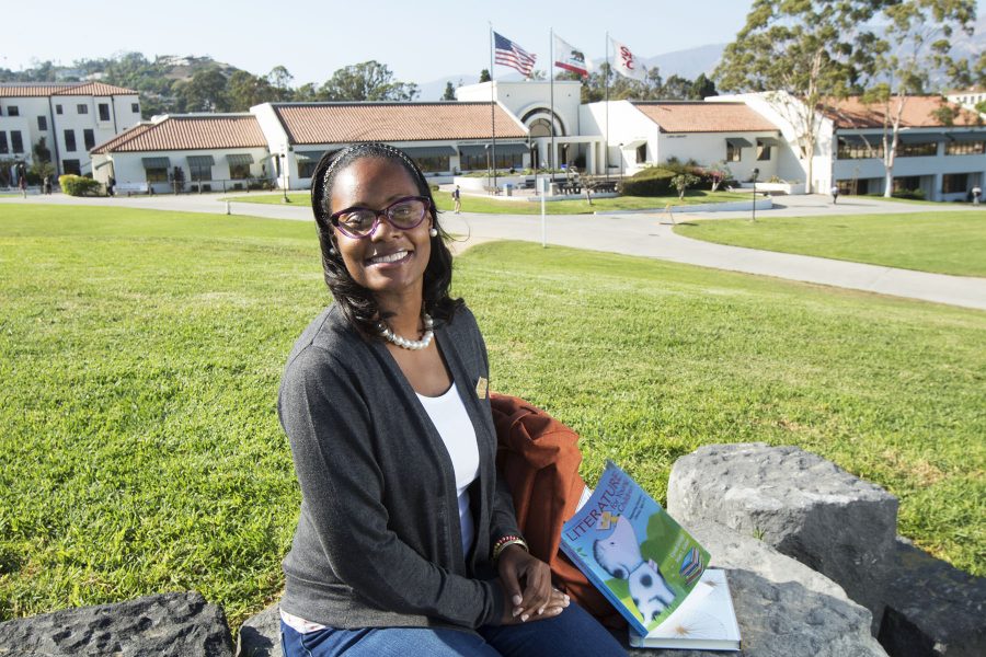 Devona Hawkins relaxes on the hill over-looking the Luria Library before her evening class on Thursday Sept. 8, on City College’s West Campus. Hawkins is the first full-time professor that has been hired for the early childhood education department at City College in several years.