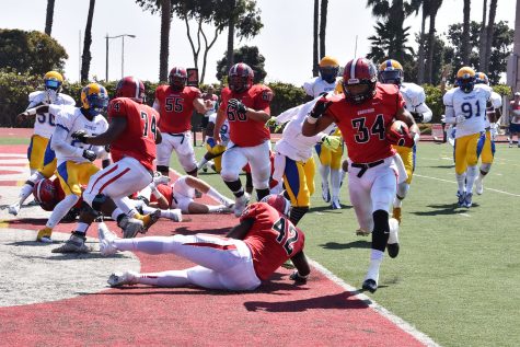 Vaquero running back Perry Martin (No. 34) runs into the end zone early in the first quarter to give City College a, 14-0, lead on Saturday, Sept. 17, at La Playa Stadium. The Vaqueros crushed Los Angeles Southwest College, 51-0.