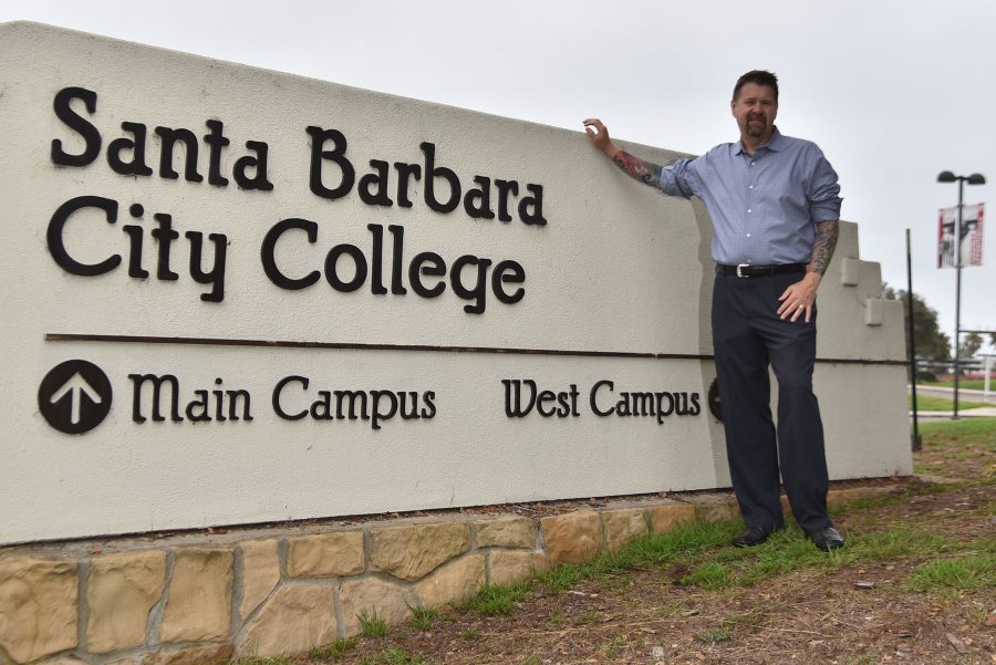 Dr. Paul Jarrell stands at the entrance to City College West Campus on Friday, Sept. 2. Jarrell joined City College in mid-June as the new executive vice president of educational services.