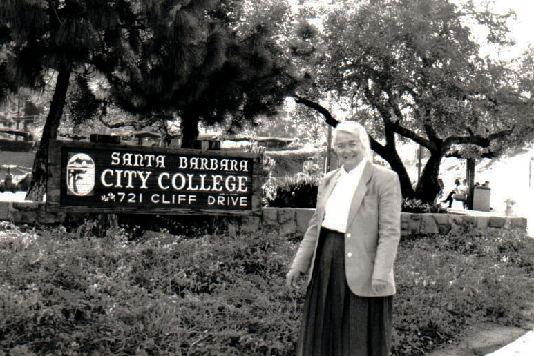 Dr. Kathryn 'Kay' Alexander stands in front of City College's Main Campus.