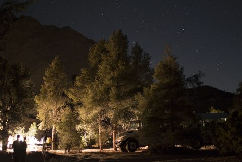 Lanterns light up the camping area for dinner as students look up at the stars on Friday, Sept. 30, in the Cuyama Badlands, north of Ojai. Geology club members and instructors spent one night exploring the badlands to collect rock samples and fossils.