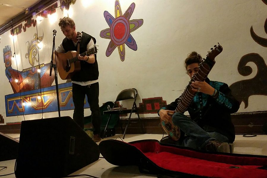 Michael Sallstrom (left) and Maz Karandish perform together for Santa Barbara Stands with the Standing Rock Thursday, Nov. 17, at Case de la Raza in Santa Barbara. The event was organized by Gabriella Hernandez as a way to raise money for supplies for the protesters.