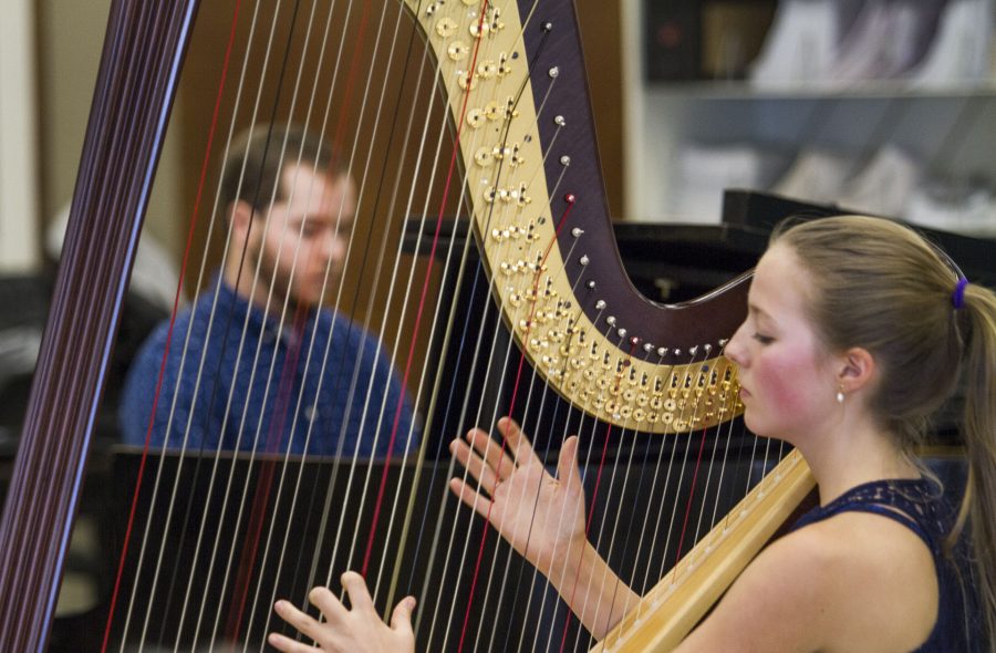 Harpist Ginger Brucker and Pianist, Wyatt Dale perform Triplets on Friday afternoon, Nov. 4, at the City College Music Salon. Triplets is an original student composition written by Music Student, Amin Sarrafi (not pictured) and Brucker.