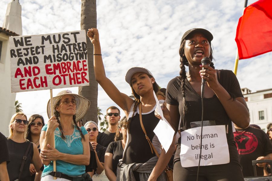 Akilah Simone Baker, a speaker from the Black Lives Matter movement, gives a speech during the united against hate march against Donald Trump, on Saturday, Nov. 12, at De La Guerra Plaza in Santa Barbara. The press release about the event said, 'Since Donald Trump began his campaign in 2015, the KKK and other violent white supremacist groups have had a resurgence.'