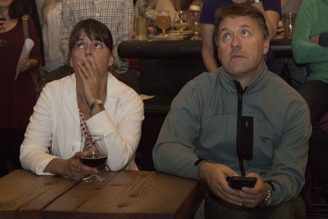 Stephanie Linder and Eamon O’Byrne watch election results on Tuesday, Nov. 8, at The Mill Restaurant and Brewery in Santa Barbara. “If this continues, we will probably be moving back to Ireland,” said Linder.