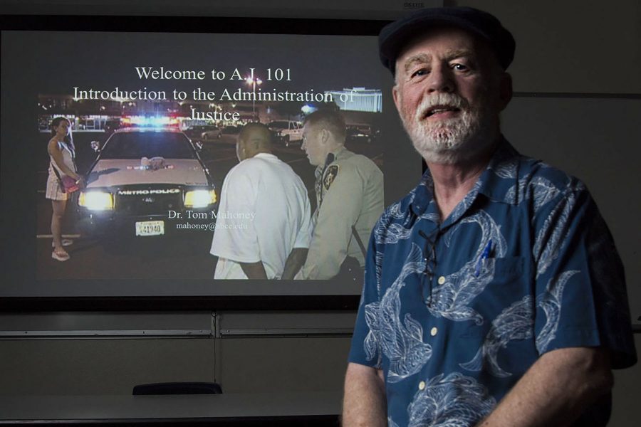 Dr. Tom Mahoney, School of Justice Studies professor, demonstrates his administration of justice lecture on Wednesday, Nov. 9, in his classroom at City College. Mahoney will be retiring at the end of the spring semester after 18 years at City College.
