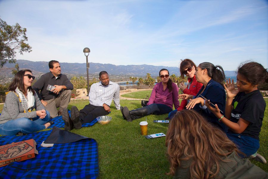 A small group of students and faculty listen to Claudia Johnson, director of dual-enrollment, discuss and give advice on social anxiety at the Brownbag lunch dialogue on Wednesday, Nov. 23 at the Maxwell Overlook at City College. The Brownbag lunch dialogues are a series of discussions aimed at creating a safe campus climate.