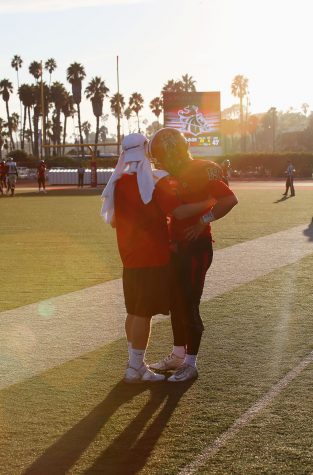 Sophomore Timothy Milliken (No.19) shows his sad emotions with his friend after The Vaqueros lose the game 47-35 to LA Valley on Nov. 12, 2016 at Santa Barbara City College, La Playa Stadium.