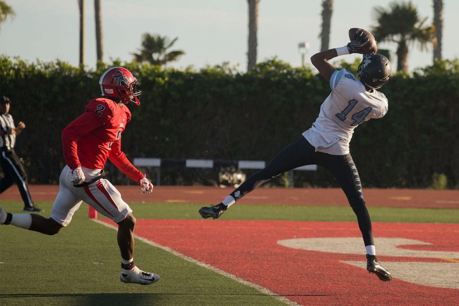 Moorpark wide receiver Emmanuel Osuchukwu (No. 14) scores their only passing touchdown against the Vaqueros during the Beach Bowl on Saturday, Nov. 19, at La Playa Stadium. The Vaqueros lost the final game of the season 49-12.