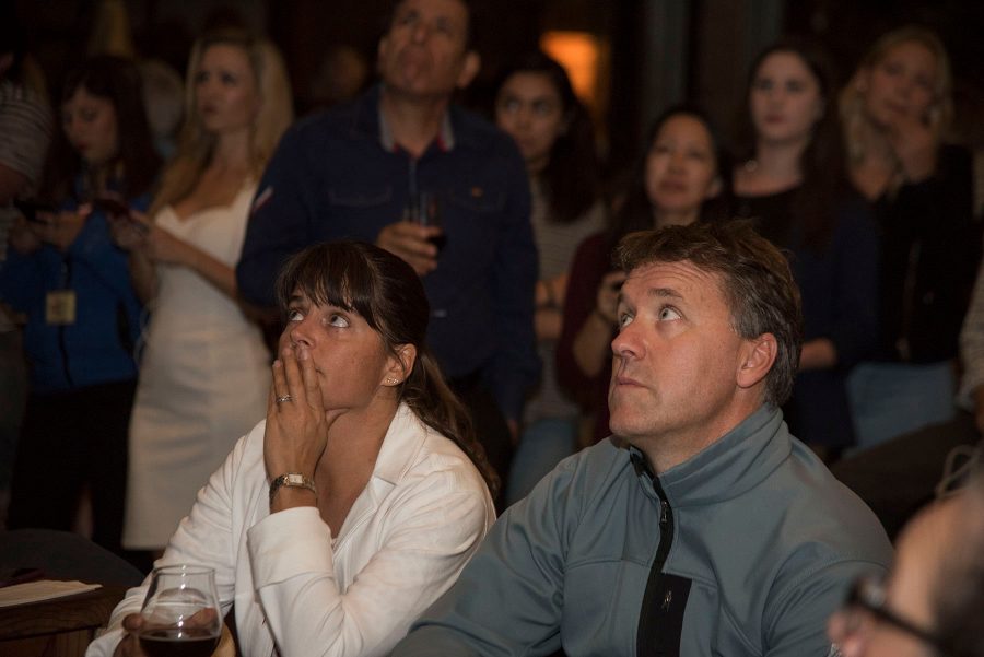 Stephanie Linder and Eamon O’Byrne watch as election results come in during the democrat election party on Tuesday, Nov. 8, at The Mill in Santa Barbara. As the news came in that Donald Trump would likely be the president they joked that they might move back to Ireland.