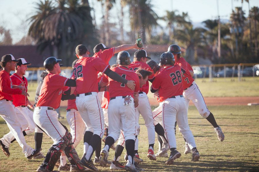 The City College Vaqueros celebrate their victory against the Cerritos College Falcons on Saturday, Jan. 28, at Pershing Park. The Vaqueros beat the Falcons, 3-2.