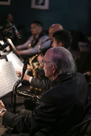 Saxophone players in the City College Good Times Big Band prepare for a show on Monday, Feb. 13, 2017, at SOhO Restaurant and Music Club in Santa Barbara, Calif.