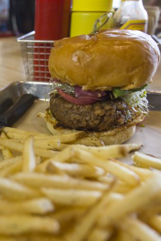 A Shoreline burger from Mesa Burger on Friday, Feb. 3, 2017, at Mesa Burger in Santa Barbara. A Shoreline Burger has a veggie patty, red pepper hummus, pickled red onions, sprouts and salsa verde. It costs $12.