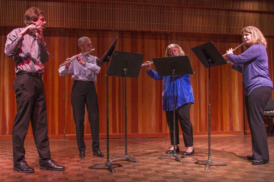 The Flute Quartet Trevor Dolin, Karen Dutton, Pamela Romani and Meredith Sedwick perform three pieces at the Chamber Winds Concert on Sunday, March 19, at the Fé Bland Forum. They played “Carinhoso Traditional” by Alberto Arantes, “Elegy” by Joseph Jongen, and “The Salt of the Earth” by Catherine McMichael.