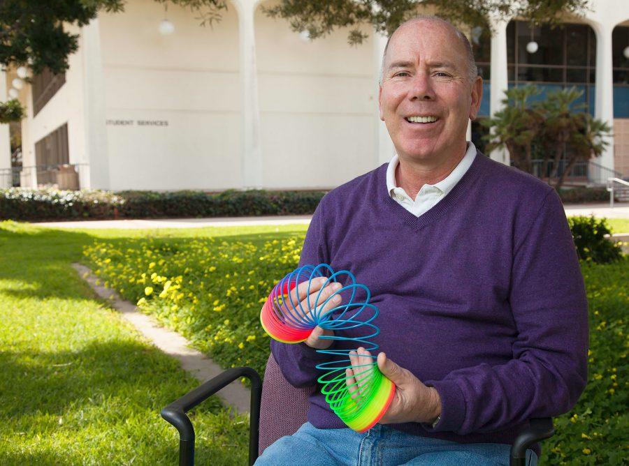 Kelly Lake, early childhood education professor, on Tuesday, March 7, outside the Student Service building at Santa Barbara City College East Campus. Lake is retiring as part of the Supplemental Early Retirement Program. He has worked at City College for 25 years.