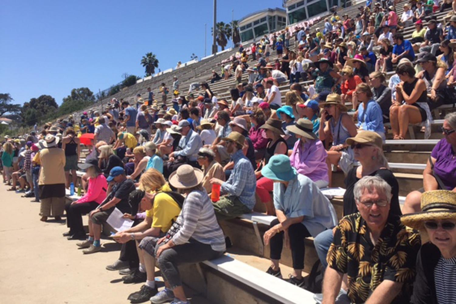 People gather for the “People’s Climate March” on Saturday, April 30, at La Playa Stadium. People marched to raise awareness about climate change and promote clean energy.